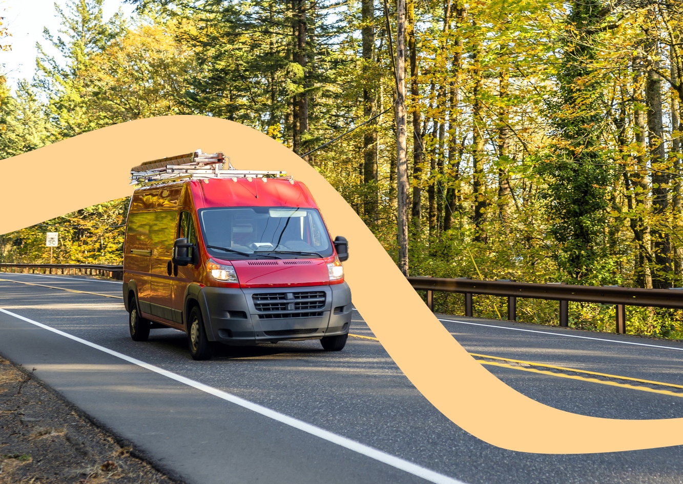 fleet van on local highway in autumn