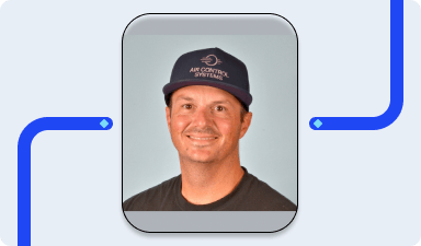 Andy Barnes, Fleet Manager at Air Control Systems, smiling in a hat