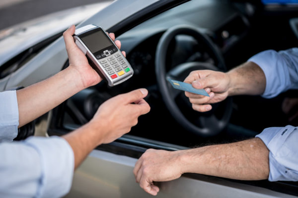 Person using business gas cards to pay