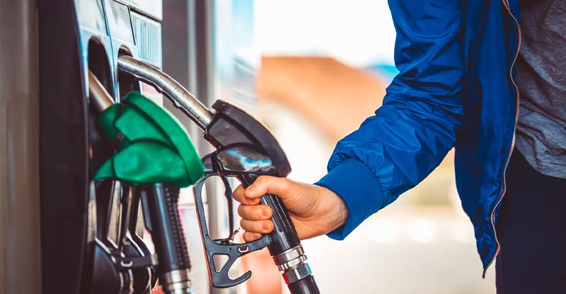 woman pumping gas