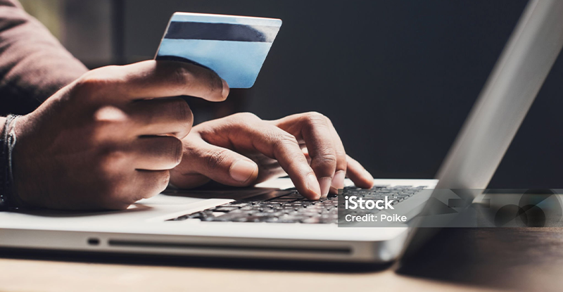 Man looking up business credit card benefits 