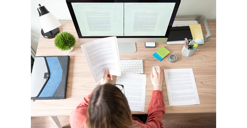 Woman checking Employee Credit Card Agreement